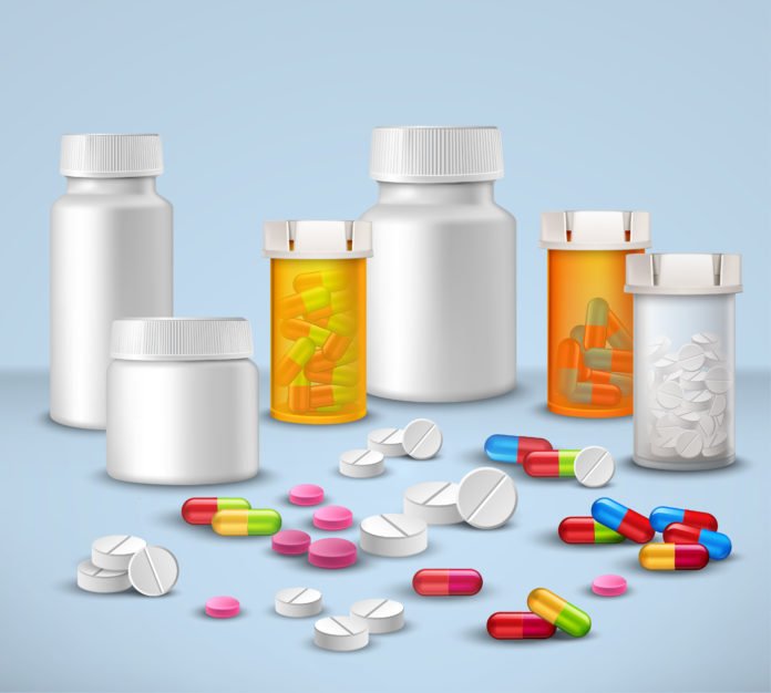 Pill Bottles Set Designed by macrovector / Freepik